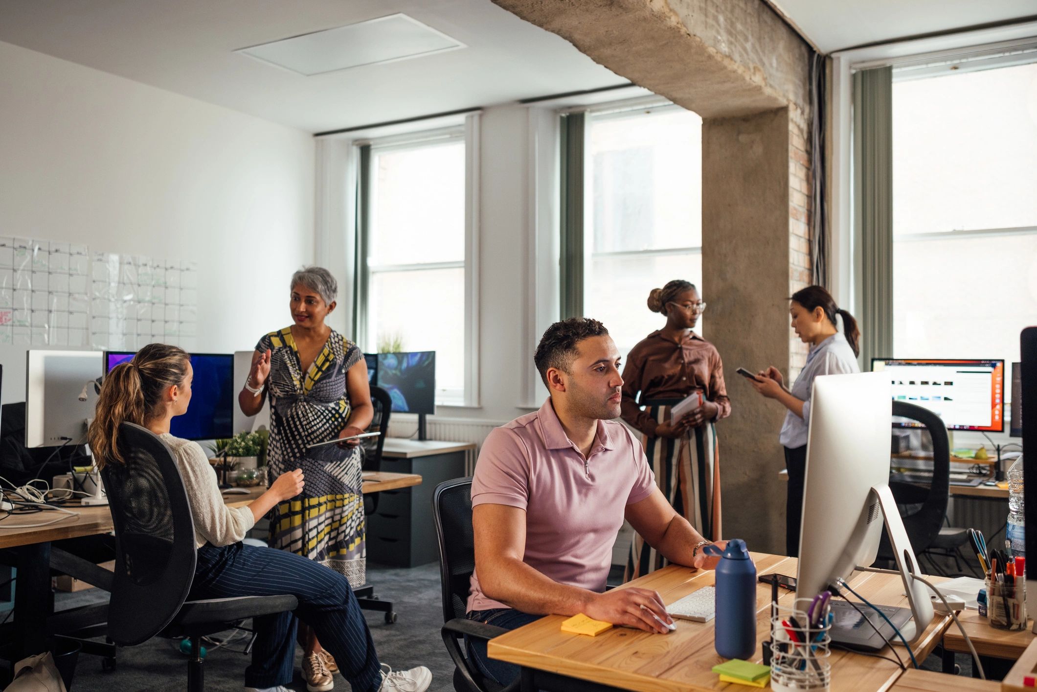 Professional team collaborating in a modern office