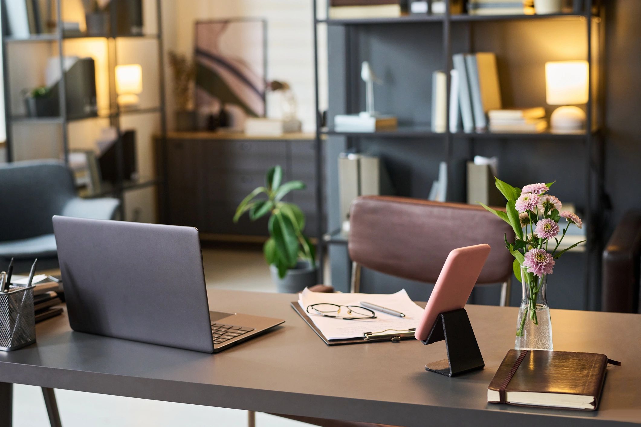 Business workspace with laptop, documents and notebook